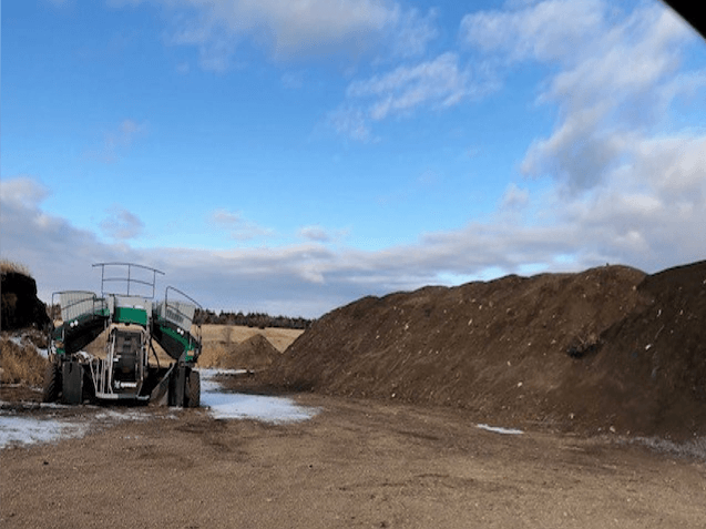 5.20.22_PICTURE OF COMPOSTER AND WINDROW